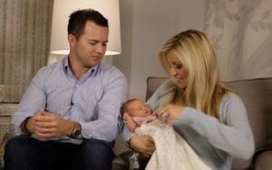 Image of Ainsley Earhardt with her husband ( Will Proctor) and kid