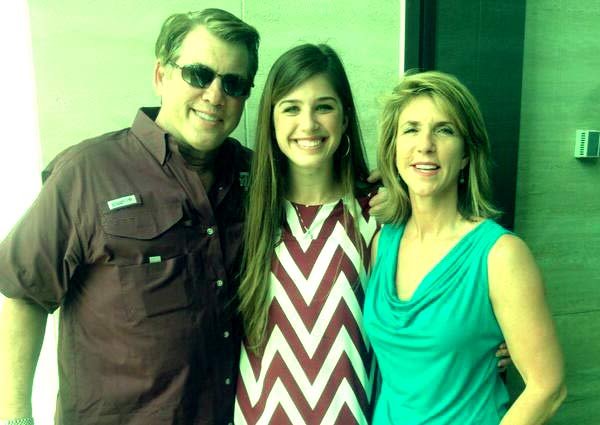 Image of Kelly Siegler with her husband Samuel Lewis Siegler II and daughter Samantha's