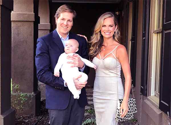 Image of Cameran Eubanks with her husband Dr Jason Wimberly and their baby