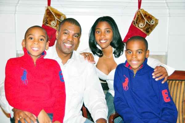 Image of Dr. Simone Whitmore with her husband Cecil Whitmore and with their kids