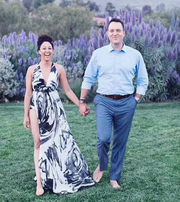 Image of Tamera Mowry with her husband Adam Housley