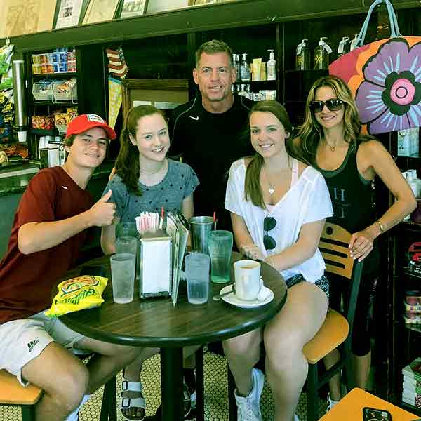 Image of Capa Mooty with her husband Troy Aikman and with their kids