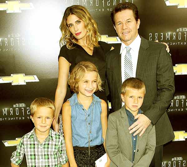 Image of Ella Rae Wahlberg with her father Mark Wahlberg, mother Brendan Wahlberg and with their brothers