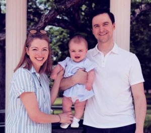 Image of Kayla Tausche with her husband Jeffery Jacob Izant and with their daughter Catharine Clancy Izant