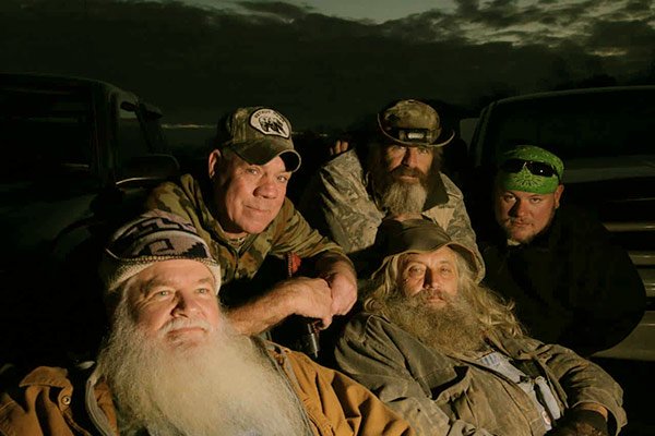 Image of Mountain Monsters cast members John "Trapper" Tice, Jeff Headlee, Huckleberry, Willy McQuillian and Jacob Buck Lowe