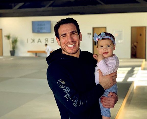 Image of Kenny Florian with his daughter