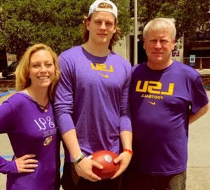 Image of Joe Burrow with his father (Jimmy Burrow) and mother (Robin Burrow)