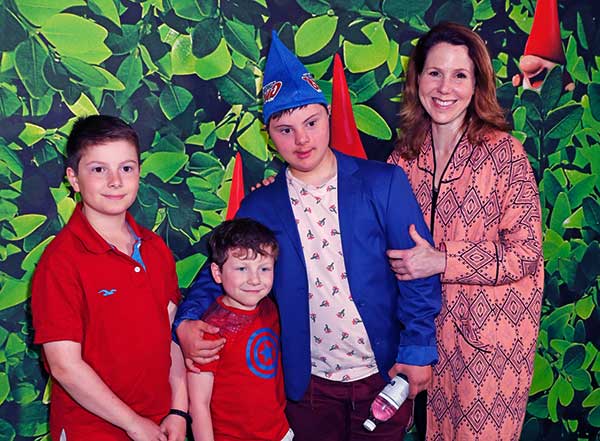 Image of  Sally Phillips with her sons, Olly, Luke and Tom
