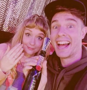 Image of Ed Gamble with his girlfriend showing the engagement ring