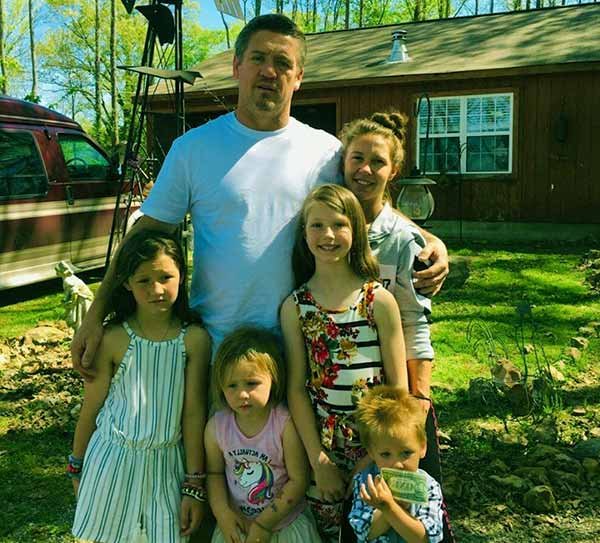 Image of Tricia, Her Husband Along With Three Lovely Daughters & A Dollar Hungry Son