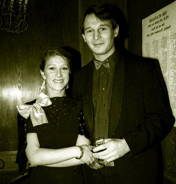 Image of Helen and Liam Neeson photograph together at the 1984 Evening Standard Film Awards